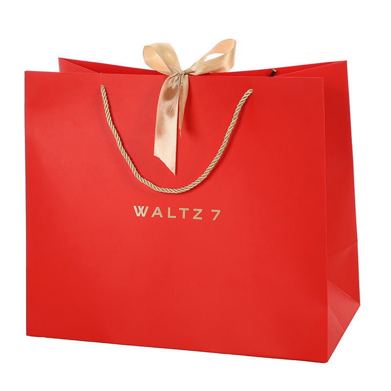 Dein Geschenk: Geschenktasche mit Goldschleife
