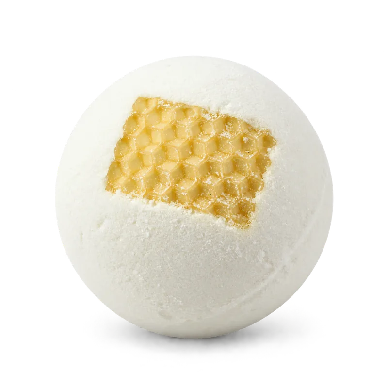 Badekugel Golden Delight: weiße Badekugel mit goldgelber Honigwaben-Einlage